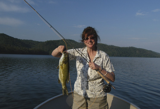 Paula Begley with a large smallmouth bass she caught on June 12, 2013 while fly fishing near Townsend, Tennessee